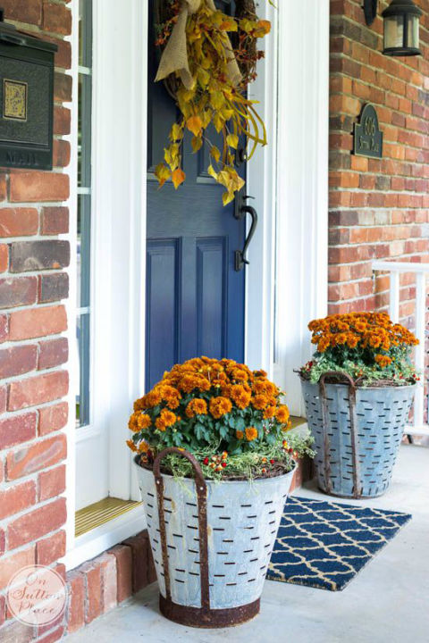 2 front porch fall decor olive bucket mums 15 Gorgeous Front Door Flower Decorations To Inspire You To Personalize Your Home