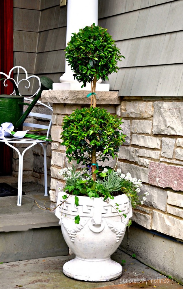 Front entry door vintage concrete urn planters bench watering can topiary lavender ivy boxwood 3 634x999 15 Gorgeous Front Door Flower Decorations To Inspire You To Personalize Your Home