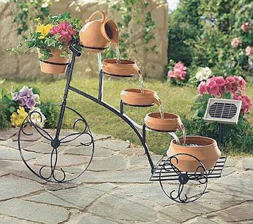 With These Decorations Make Your Garden Look More Interesting antique bycycle waterfall fountain garden decorations1 With These Decorations Make Your Garden Look More Interesting