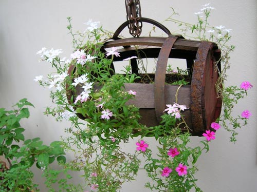 With These Decorations Make Your Garden Look More Interesting barrel With These Decorations Make Your Garden Look More Interesting