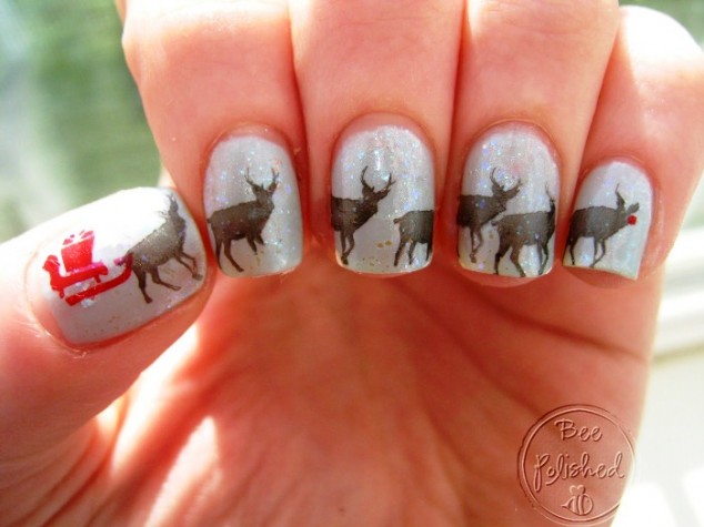 cute christmas black and white reindeer nail art 634x475 17 Christmas Nail Art Design