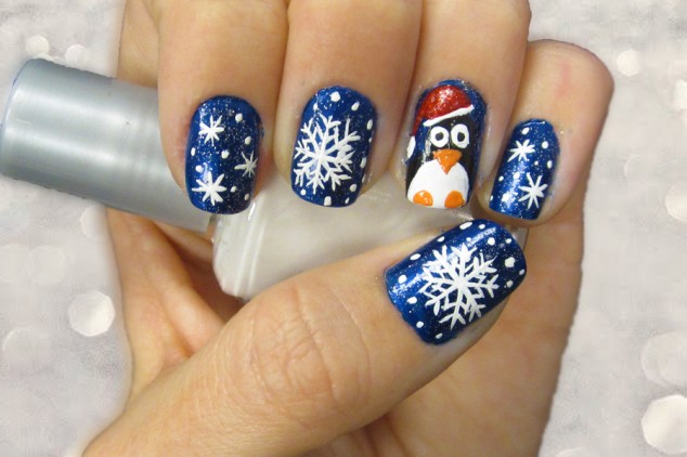 nail art creative christmas themed snow and pinguin print nail art design with cool blue glitter cool easy nail design ideas 634x422 17 Christmas Nail Art Design