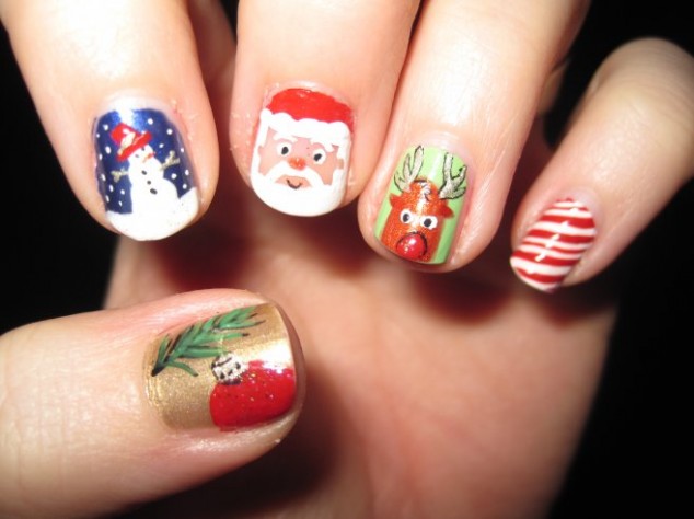 snowy santa christmas nail art by inspirations christmas nail art design 657x492 634x474 17 Christmas Nail Art Design