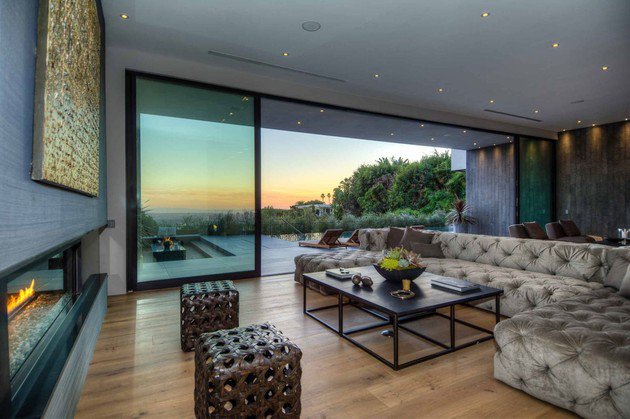 15 Extraordinary Living Room Decorations luxurious la home with glass walls and courtyard views 7 thumb 630x419 30818 15 Extraordinary Living Room Decorations