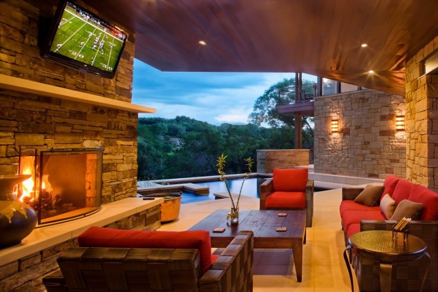 18 Eye Catching Living Room Designs That Will Make You Say Wow Modern fireplace with outdoor pool and warm sofa 634x423 18 Eye Catching Living Room Designs That Will Make You Say Wow