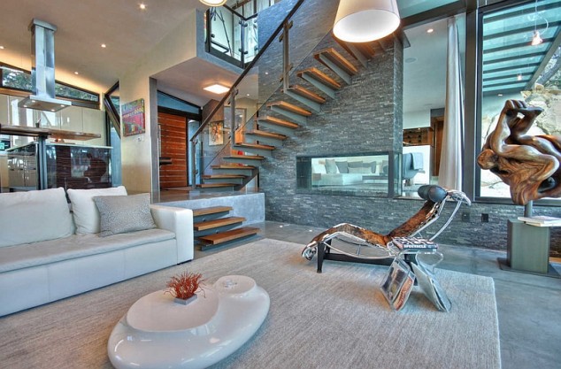 18 Eye Catching Living Room Designs That Will Make You Say Wow Sculptural additions steal the show in this cool sunken living room 634x417 18 Eye Catching Living Room Designs That Will Make You Say Wow