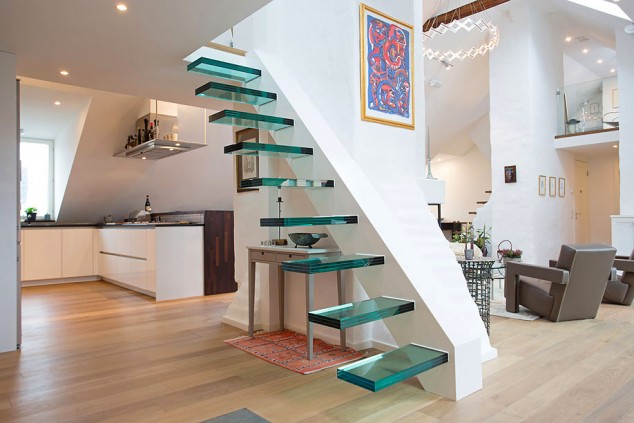 14 The Most Cool Floating Staircase Designs For Your Home extraordinary fancy glass floating staircase plus wall art painting decor with white kitchen interiors on laminate floor mixed 634x423 14 The Most Cool Floating Staircase Designs For Your Home