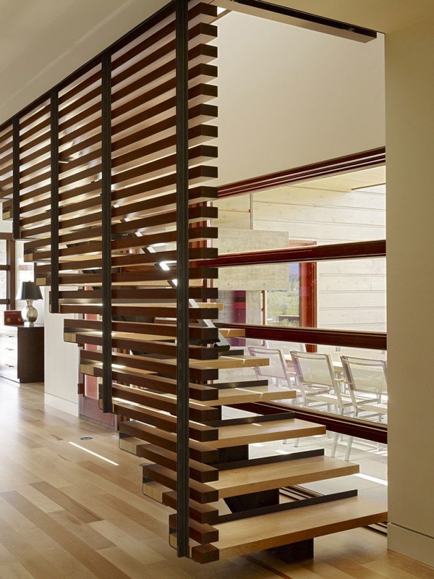 wooden staircase with wood wall cladding railings residence design ideas 634x846 14 The Most Cool Floating Staircase Designs For Your Home