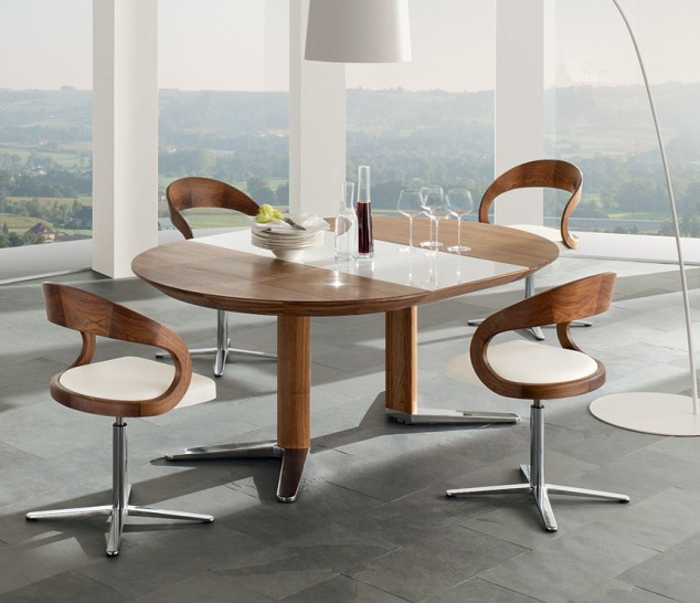 oval walnut dining table girado md 634x546 16 Stylish Dining Tables For Your Home