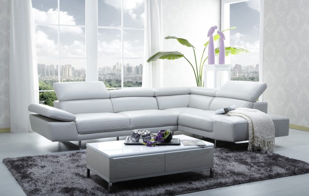 remarkable small contemporary living room design with beautiful white floral walpaper decors combined white leather sofa plus rectangular coffee table above sweet gray fur rugs and green floral in corner together bay window plus white curtains 634x401 16 Leather Sofas for Modern Living Room Design
