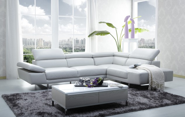 16 Leather Sofas for Modern Living Room Design remarkable small contemporary living room design with beautiful white floral walpaper decors combined white leather sofa plus rectangular coffee table above sweet gray fur rugs and green floral in corner together bay window plus white curtains 634x401 16 Leather Sofas for Modern Living Room Design