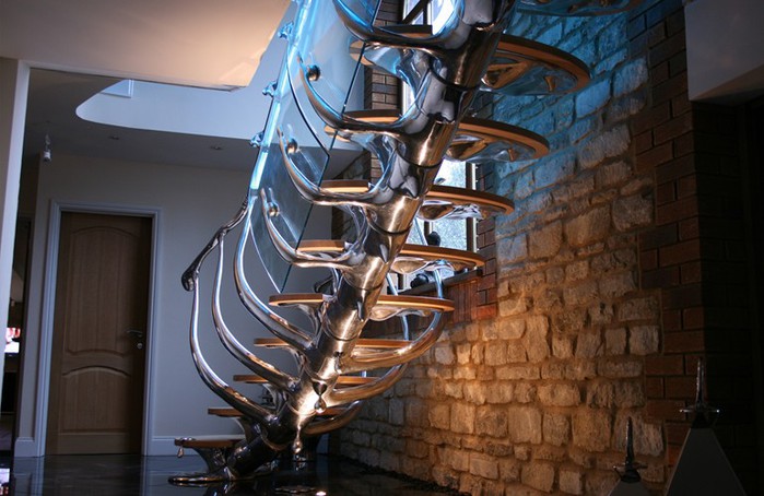122199693 4027137 sculpturalstaircasewithglassandtimberdetailsprivateclientnorthampton 1 16 Unique & Creative Staircase Designs That Will Leave You Speechless