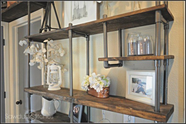 21 Functional Metal Pipe DIY Ideas Youve Never Thought Of industrial shelves 600x401 21 Functional Metal Pipe DIY Ideas Youve Never Thought Of
