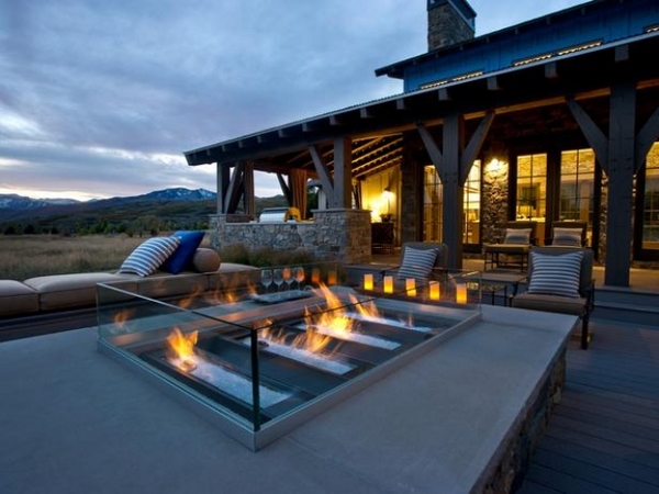18 Of The Best Outdoor Fireplaces Design Ideas For A Modern Patio spectacular outdoor fireplace glass walls gravel patio design ideas 18 Of The Best Outdoor Fireplaces Design Ideas For A Modern Patio