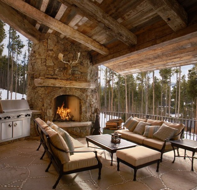 Great Rustic Colorado Outdoor Patio Living with Custom Fireplace 634x611 16 Awe Inspiring Rustic Patios That Will Be Your Favorite Escape For Sure