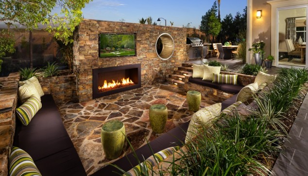 rustic patio with contemporary fireplace i g ISxb7t38fdemvk0000000000 bUXA5 634x363 16 Awe Inspiring Rustic Patios That Will Be Your Favorite Escape For Sure