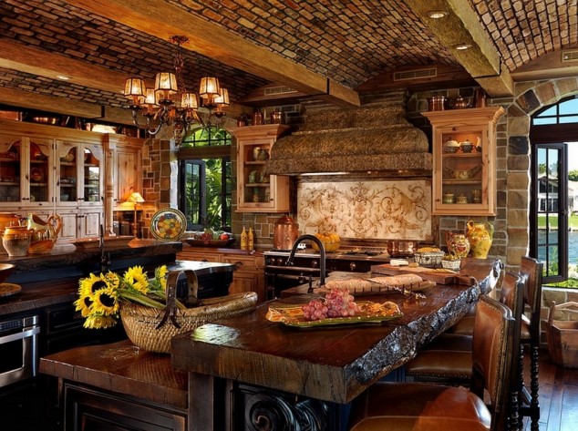 Feel the Warmth of Rustic Kitchen Designs with Stones and Wood Amazing Mediterranean kitchen with stone clad wall and some art deco with smart lighting and dreamy cozy setting 1024x764 634x473 Feel the Warmth of Rustic Kitchen Designs with Stones and Wood