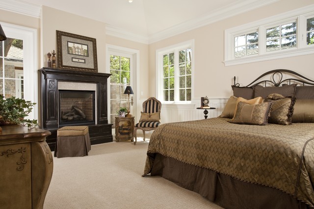15 Elegant And Inspiring Master Bedroom Fireplace Ideas traditional bedroom pain nerd furniture traditional fireplaces beadboard beige wall crown molding 15 Elegant And Inspiring Master Bedroom Fireplace Ideas
