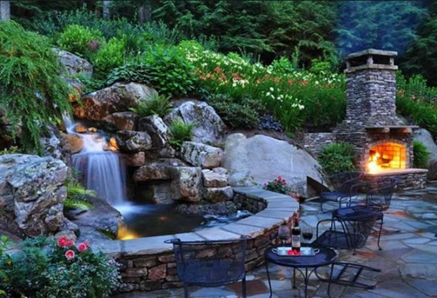 Backyard patio garden decoration ideas with ponds and waterfalls for the backyard and stone fireplace surround 634x433 13 Eye Popping Fountains That Are Absolutely A Must For Every Garden