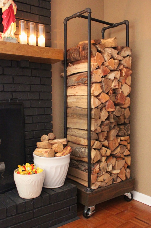 16 Brilliant Ideas How To Create Appealing Firewood Storage Space At Home a diy thing of beauty rolling log holder made from plumbing pipes 634x955 16 Brilliant Ideas How To Create Appealing Firewood Storage Space At Home