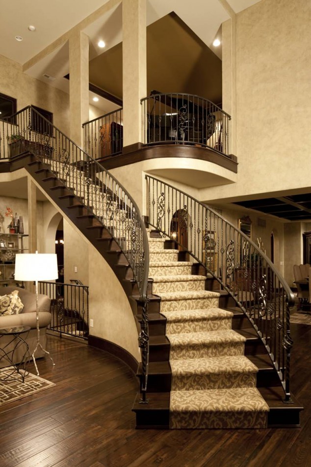 18 Awesome Foyer Designs That Will Help You Personalize Your Entrance banister and carpet for stairs with dark wood flooring plus faux finish also handrail with wrought iron railing in modern home plus floor lamp and couch for living room decor 634x951 18 Awesome Foyer Designs That Will Help You Personalize Your Entrance