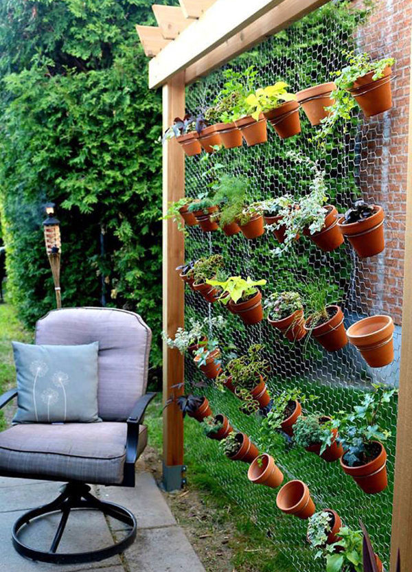 12 Ideas Which Materials to Use to Make A Vertical Garden creative vertical garden in backyard 12 Ideas Which Materials to Use to Make A Vertical Garden