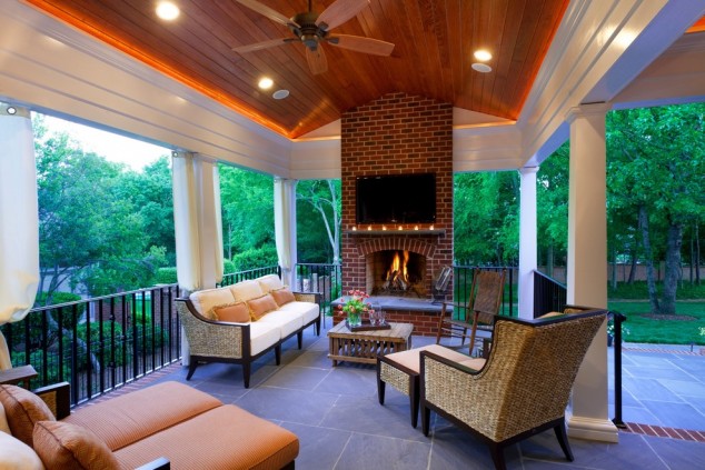 13 Ideas How To Make An Inviting Patio Design Using Bricks Canvas Curtains Bluestone Fireplace 634x423 13 Ideas How To Make An Inviting Patio Design Using Bricks
