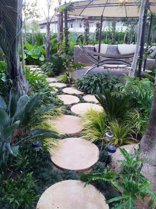 Marvelous Backyard Oasis decorating ideas for Landscape Tropical design ideas with Marvelous covered patio grasses 634x846 15 Creative Round Stepping Paths That Will Make Your Garden Beautiful And Remarkable