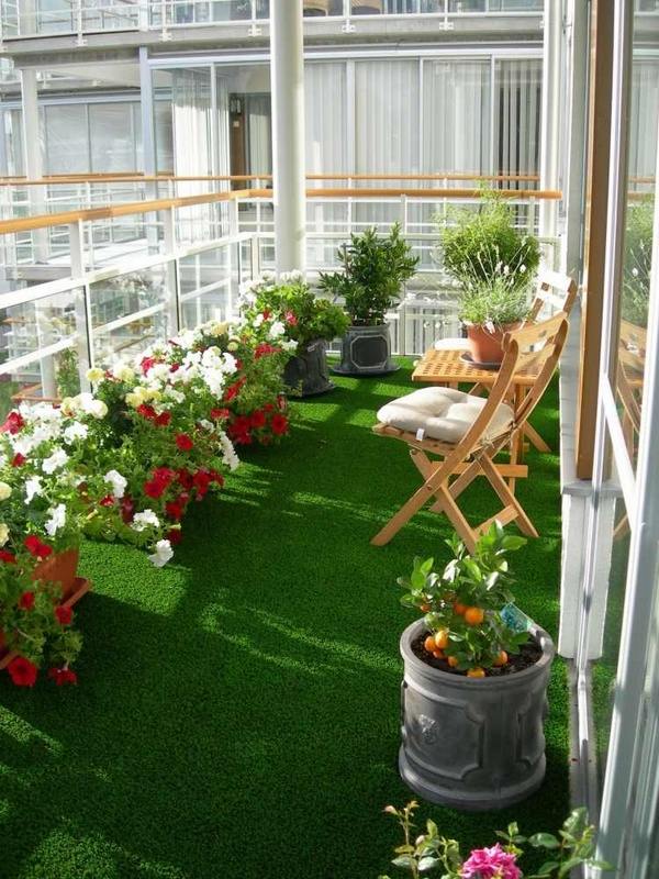 15 Chic And Interesting Ideas For Your Balcony Floor beautiful balcony garden flower pots wooden furniture 15 Chic And Interesting Ideas For Your Balcony Floor