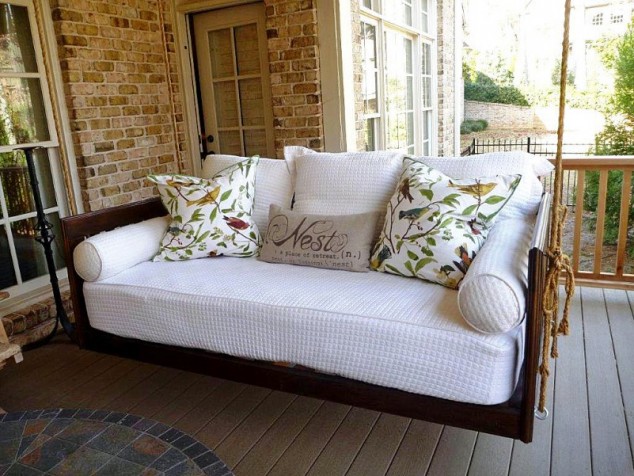 15 Relaxing Hanging Beds For Absolute Enjoyment ergonomic hanging outdoor bed combined with shabby chic terrace design and brown wood railing banister 801x601 634x476 15 Relaxing Hanging Beds For Absolute Enjoyment