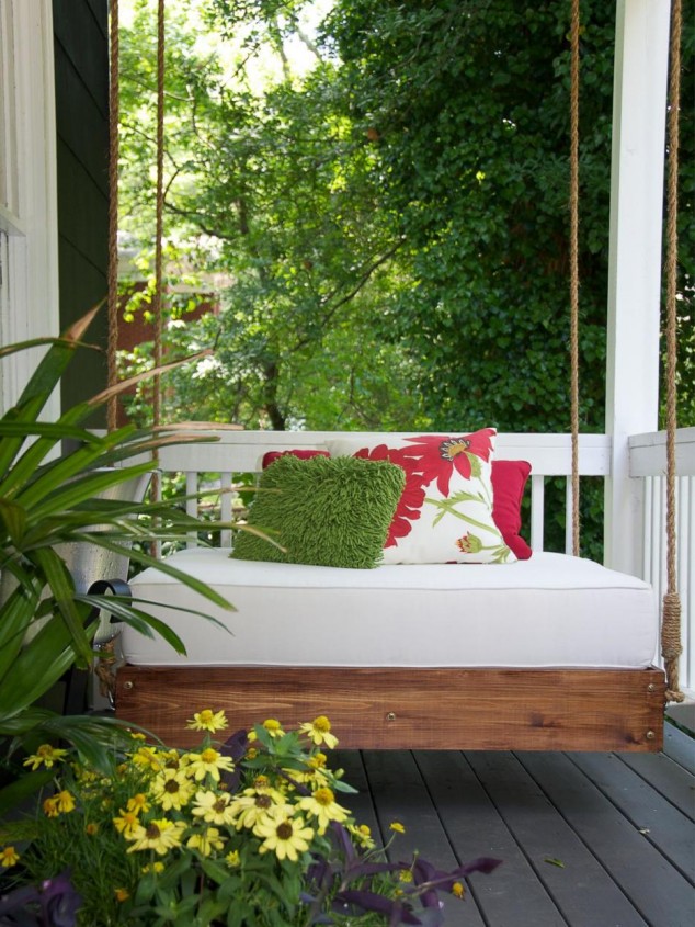 15 Relaxing Hanging Beds For Absolute Enjoyment furniture exterior brown wooden porch swings with white canopy and white matress plus natural cushion style on wooden floor interesting design of patio swings with canopy 936x1248 634x845 15 Relaxing Hanging Beds For Absolute Enjoyment