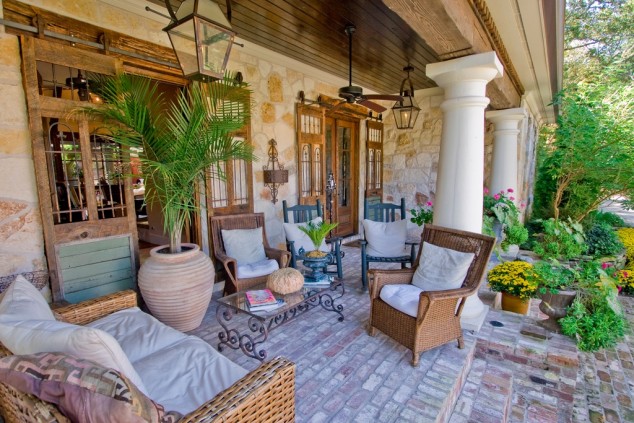 mediterranean patio with sunroom i g ISx356a95nsps70000000000 mgPZI 634x423 16 Adorable Colorful Porch Designs For Creating A Welcoming Atmosphere