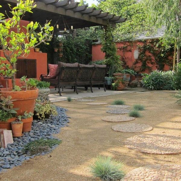 15 Creative Round Stepping Paths That Will Make Your Garden Beautiful And Remarkable patio design DG wooden pergola outdoor furniture flower pots 15 Creative Round Stepping Paths That Will Make Your Garden Beautiful And Remarkable