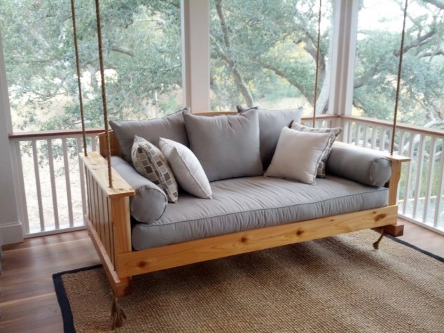 15 Relaxing Hanging Beds For Absolute Enjoyment terrace with vegetation surround idea also contemporary hanging bed swing design plus brown outdoor rug 1024x768 634x476 15 Relaxing Hanging Beds For Absolute Enjoyment