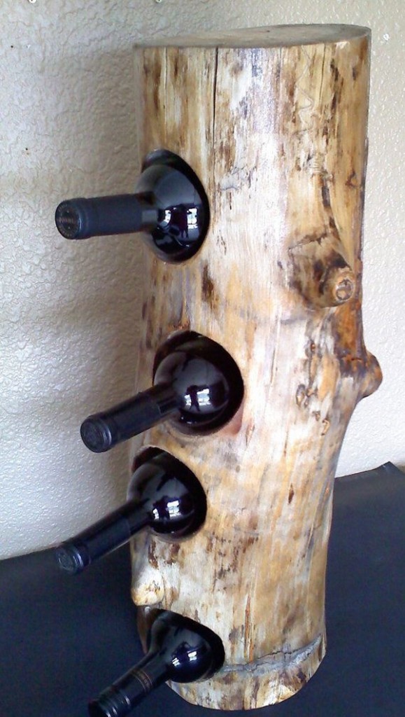 15 Fantastic DIY Home And Garden Wood Log Decorations winerack 579x1024 15 Fantastic DIY Home And Garden Wood Log Decorations