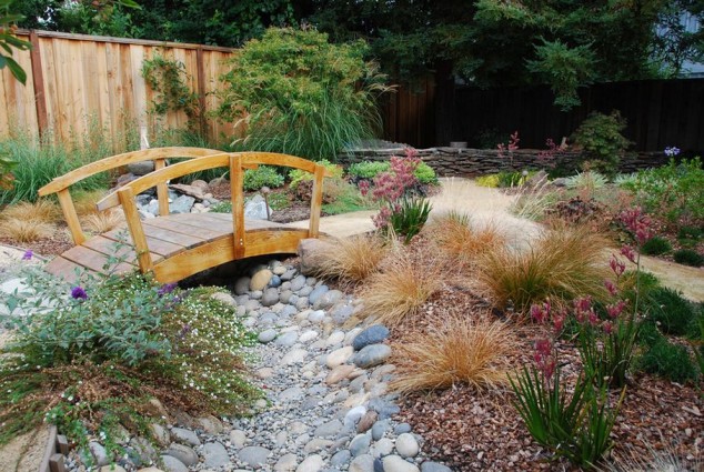 21 Brilliant Wooden Garden Bridges That Could Fill The Garden With Beauty And Charm wrought iron bridges 12 634x425 21 Brilliant Wooden Garden Bridges That Could Fill The Garden With Beauty And Charm