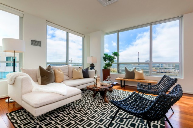 14 Inspirational Ideas To Add Rug In The Living Room Cool White Sectional Sofa fashion San Francisco Contemporary Living Room Inspiration with beautiful Beige Sectional Sofa black and white rug bright condo dramatic high rise large windows 634x423 14 Inspirational Ideas To Add Rug In The Living Room