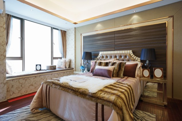 17 Well Designed Bedroom Headboard Walls bed with gold framed headboard wood flooring 634x422 17 Well Designed Bedroom Headboard Walls