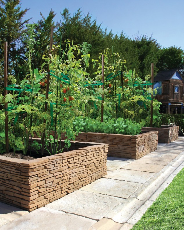 14 Stunning Raised Garden Beds For Growing Healthy Vegies spielhaus garten selber bauen im mediterran garten mit vegetable garden und stacked stone 634x793 14 Stunning Raised Garden Beds For Growing Healthy Vegies
