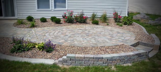 Stone Bed Landscaping Paver Patio and Step 634x287 13 Circle Patio Ideas That Are Attractive For Your Eyes