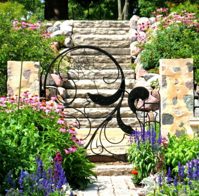 14 Simple But Attractive Garden Doors And Garden Mirrors garden gates cool design octopus garden plants 634x625 14 Simple But Attractive Garden Doors And Garden Mirrors