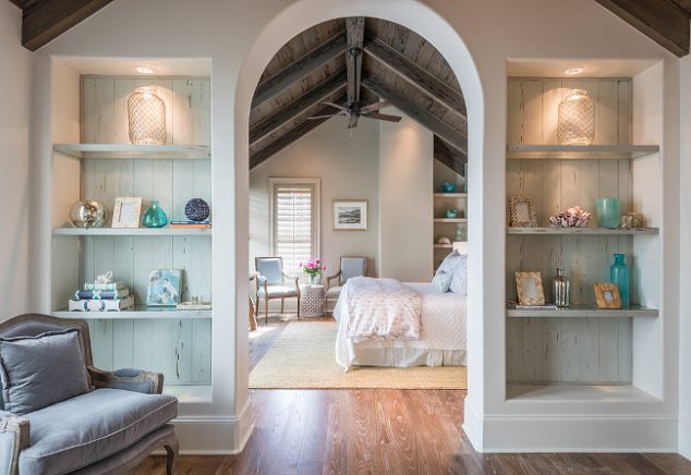 Arched Bedroom sitting Area. An arched doorway to a bedroom is flanked by built in bookcases lined with distressed plank boards. Arched Bedroom SittingArea Old Seagrove Homes.  634x436 15 Exotic Bedroom Seating Area For Extra Comfort