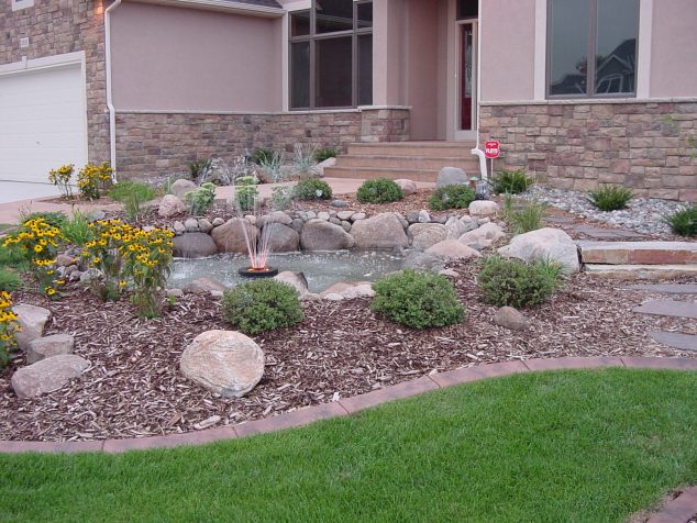 Stone Patio Edging 634x476 12 Attractive Garden Edging Ideas With River Stones That Provide Inspiration