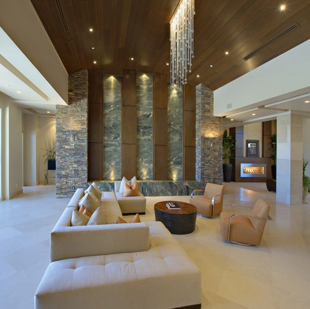 massive living room in luxury home with high ceilings 1 634x632 13 High Ceiling Living Room That Will Make The Room Bigger