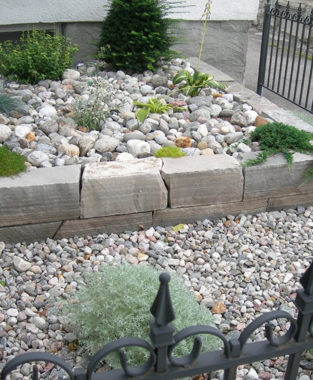 river rock landscape stone 634x769 12 Attractive Garden Edging Ideas With River Stones That Provide Inspiration