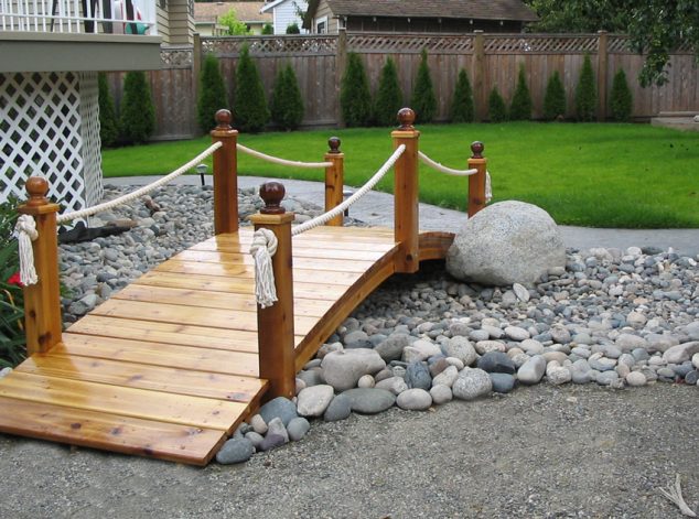 Garden Bridge 634x471 15 Inspirative Garden Pond With Bridge That You Would Like To See