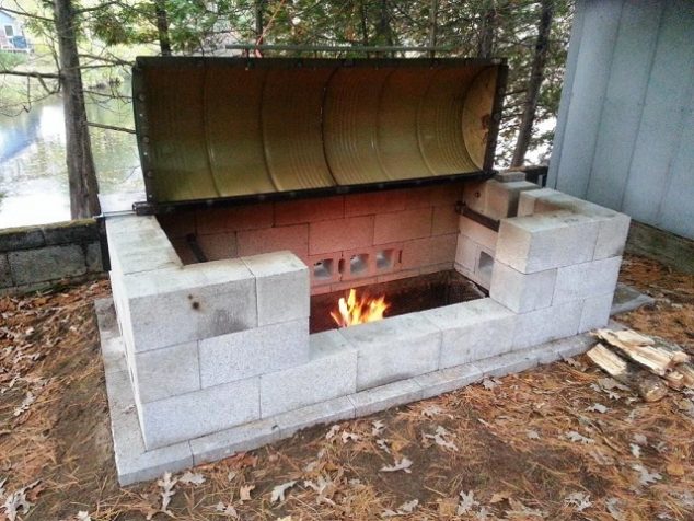 Large Rotisserie Pit BBQ 11 634x476 13 Bricks Backyard Barbecue That You Could Build For The Weekend