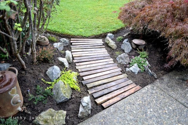 Pallet wood garden walkway 634x423 13 DIY Garden Pathway Inspiration For All Garden Lovers