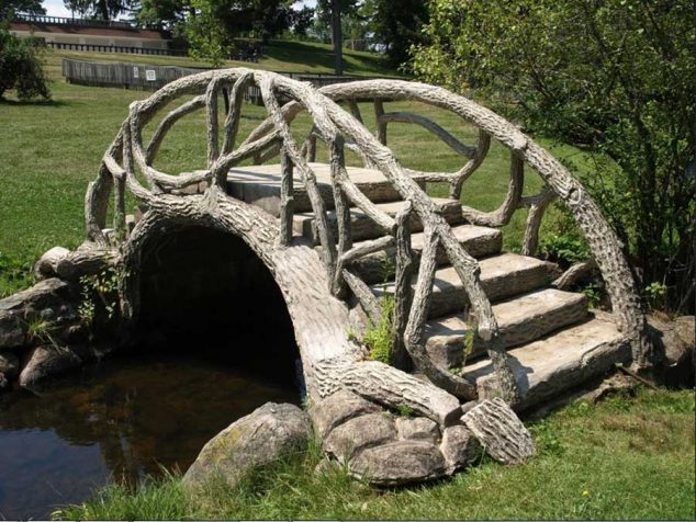 Small bridge design with stone material design above garden backyard pond design 634x476 15 Inspirative Garden Pond With Bridge That You Would Like To See