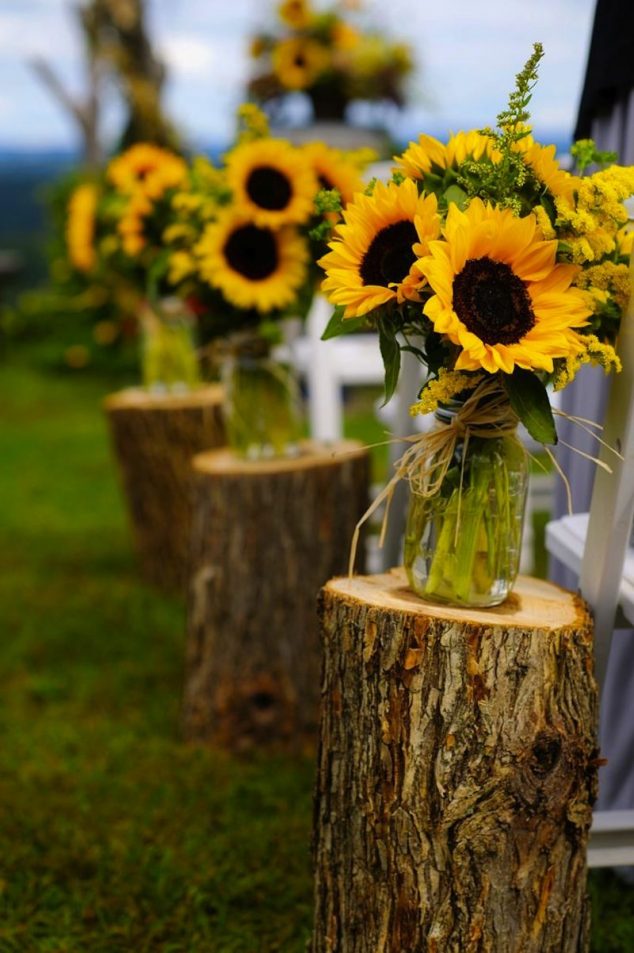 Sunflowers e1469416554760 634x953 14 DIY Wooden Stump Vases That Simplicity Defining Beauty In House